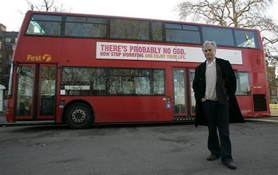 Professor Richard Dawkins, the author of non-fiction book 'The God Delusion', poses for photographers in front of a London bus featuring the atheist advertisement with the slogan 'There's probably no God. Now stop worrying and enjoy your life' in London, Tuesday, Jan. 6, 2009. The campaign supported by professor Dawkins and the British Humanist Association is a response to evangelical Christian advertisements running on buses in June 2008. For the campaign 800 buses featuring the slogan are running across the country and 1000 advertisements are posted on the London underground railway system. <br/>Photo: AP Images / Akira Suemori