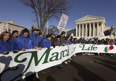 Abortion opponents march in front of the Supreme Court in Washington, Thursday, Jan. 22, 2009, during the annual March for Life. <br/>Photo: AP Images / Pablo Martinez Monsivais