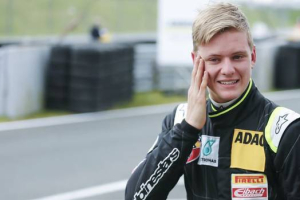 Van Ammersfoort Formula Four driver Mick Schumacher of Germany smiles as he leaves the pitlane after the second race of the ADAC F4 season at the Motorsport Arena in Oschersleben, Germany, April 26, 2015.<br />
(HANNIBAL HANSCHKE/REUTERS) <br/>