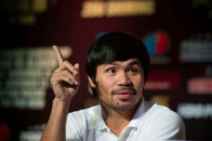 Manny Pacquiao keeps his focus on God as he prepares for the 'fight of the cenutry' against Floyd Mayweather Jr.  <br/>