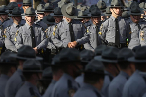Pennsylvania State Police line the streets outside St. Peters' Cathedral in Scranton, Thursday, Sept. 18, 2014, for the funeral service for slain Cpl. Bryon Dickson, 38 <br/>Reuters