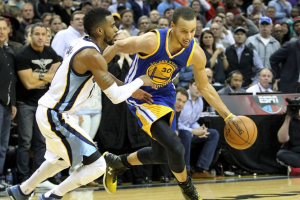 Dec 16, 2014; Memphis, TN, USA; Golden State Warriors guard Stephen Curry (30) drives to the basket in the fourth quarter as Memphis Grizzlies guard Mike Conley (11) defends at FedExForum. Grizzlies defeated the Warriors 105-98. Mandatory Credit: Nelson Chenault-USA TODAY Sports <br/>