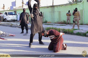 ISIS beheads an Iraqi soldier in public execution. <br/>IBC World News