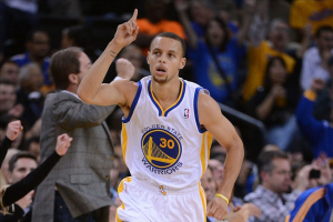 Golden State Warriors point guard Stephen Curry (30) celebrates after making a basket against the Oklahoma City Thunder during the first quarter at Oracle Arena. <br/>