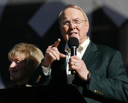 In this file photo, James Dobson, founder of Focus on the Family, speaks as his wife Shirley looks on during a <br/>(Photo: AP Images / Denis Poroy)