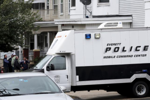 Law enforcement officials are gathered on a residential street in Everett, Massachusetts June 2, 2015 in connection to a man shot dead by law enforcement in Boston after coming at them with a large knife when they tried to question him as part of a terrorism-related investigation, authorities said. REUTERS/Brian Snyder <br/>