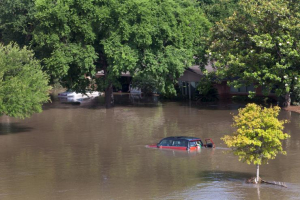 Cars and houses are seen covered by floodwaters in southwest Houston, Texas on May 26, 2015. Torrential rains have killed at least eight people in Texas and Oklahoma, including two in Houston where flooding turned streets into rivers and led to nearly 1,000 calls for help in the fourth-most populous U.S. city, officials said on Tuesday. Reuters <br/>