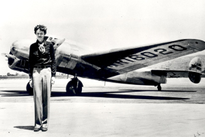 Amelia Earhart and the Lockheed Electra in which she disappeared in July 1937. NASA/WIKIMEDIA COMMONS <br/>