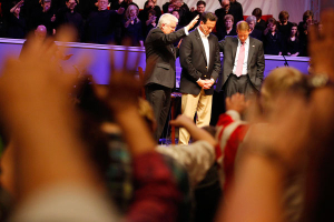 Republican presidential candidate and former U.S. Senator Rick Santorum (C) receives a blessing from Pastor Dennis E. Terry, Sr. (L) after being interviewed by Family Research Council President Tony Perkins (R) at Greenwell Springs Baptist Church in Greenwell Springs, Louisiana March 18, 2012. <br/>(Photo: REUTERS/Sean Gardner)