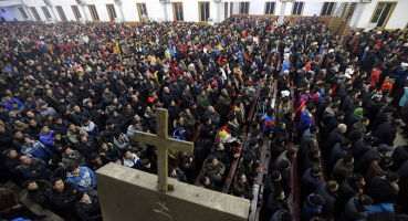 Believers in China gather for service. Jason Lee/Reuters <br/>