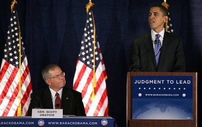 In this Dec. 18, 2007, file photo, Democratic presidential hopeful, Sen. Barack Obama, D-Ill., right, speaks prior to a foreign policy forum as retired Air Force Maj. Gen. J. Scott Gration listens in Des Moines, Iowa. On March 18, 2008, President Barack Obama named Gration as the U.S. special envoy to Sudan. <br/>(Photo: AP Images / Kevin Sanders)
