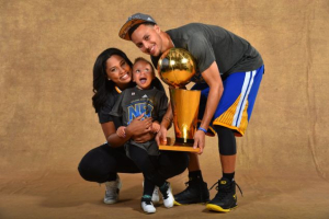 Isn't Riley Curry cute? Perhaps even better. (Jesse D. Garrabrant/NBAE/Getty Images) <br/>