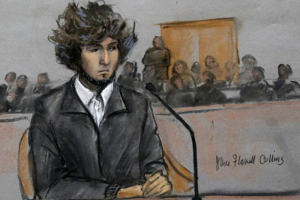 In this Dec. 18, 2014, courtroom sketch, Boston Marathon bombing suspect Dzhokhar Tsarnaev sits in federal court in Boston.  <br/>(Jane Flavell Collins via AP, File)