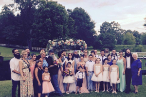 The Robertson family takes family photo at John Luke and Mary Kate's wedding. Photo: Duck Commander/Facebook <br/>