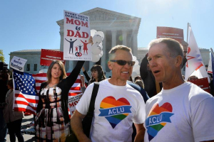 Supporters and opponents of same-sex marriage gather outside the Supreme Court on Tuesday. Photo: Oliver Douliery/Getty Images <br/>