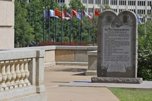 The Ten Commandments monument is pictured at the state Capitol in Oklahoma City, Tuesday, June 30, 2015. Oklahoma's Supreme Court says the monument must be removed because it indirectly benefits the Jewish and Christian faiths in violation of the state constitution. <br/>AP Photo