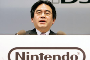 Satoru Iwata, president of Nintendo, speaks at a press conference to unveil a new portable game console DS Lite in 2006. Photo: Toru Yamanaka, AFP/Getty Images <br/>