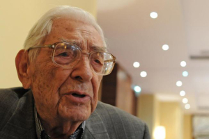 Rescuer Janusz Durko, 100 years old, speaks to The Associated Press at an event gathering nearly 50 elderly Christian Poles who saved Jews during World War II, in Warsaw, Poland, Sunday, July 12, 2015. (AP Photo/Alik Keplicz)  <br/>