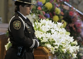 A member of the North Carolina Honor Guard stands beside the casket of Ruth Graham before a memorial service for the wife of evangelist Billy Graham in Montreat, N.C., Saturday, June 16, 2007. <br/>