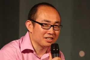 Chinese Christian real-estate guru Shi-yi Pan believes that the essence of the economic crisis is spiritual and faith crises. <br/>Photo: Sinanet) 