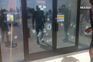 Bullets pierced the glass doors of the military recruiting center on Lee Highway in Chattanooga, Tennessee.  <br/>April Grimmett/Twitter