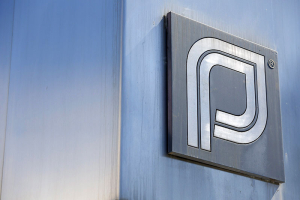 The Planned Parenthood logo is pictured outside a clinic in Boston, Massachusetts, June 27, 2014. The U.S. Supreme Court handed a victory to anti-abortion activists on Thursday by making it harder for states to enact laws aimed at helping patients entering abortion clinics to avoid protesters, striking down a Massachusetts statute that had created a no-entry zone. REUTERS/Dominick Reuter  <br/>