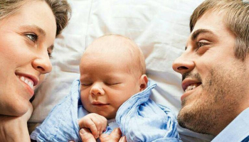 Jill and Derick Dillard pictured with their son, Israel David, who was born April 6, 2015. <br/>