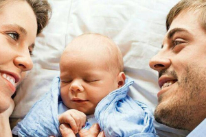 Jill and Derick Dillard pictured with their son, Israel David, who was born April 6, 2015. <br/>