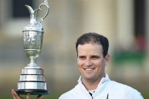 Zach Johnson celebrates with the Claret Jug after winning the 144th British Open.  Ian Rutherford/USA Today Sports <br/>