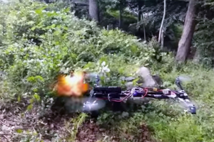 Unmanned aerial vehicle or drone fires a gun shot.  <br/>