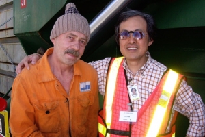 Captain (LHM) Lam and a fellow seaman at the seaport in Vancouver. <br/>(www.sealight.org)