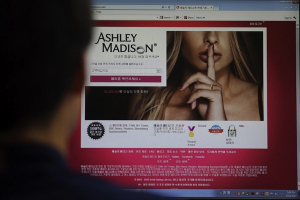In this June 10, 2015 photo, Ashley Madison's Korean web site is shown on a computer screen in Seoul, South Korea. Lee Jin-man/AP/File <br/>
