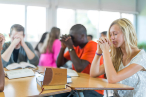 In 1962, the United States Supreme Court ruled that official prayer had no place in public education. <br/>iStock photo