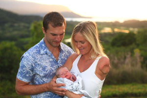 Bethany Hamilton and her husband, Adam, with their infant son. <br/>Instagram/BethanyHamilton