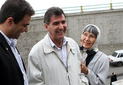 Reza Saberi and his wife Akiko, parents of US-Iranian journalist Roxana Saberi, wait with an unidentified relative outside Evin prison before their daughter is released in Tehran, Iran on Monday May 11, 2009. A lawyer for the journalist jailed in Iran says she will be freed from prison after an appeals court suspended her eight-year jail sentence. Roxana, a 32-year-old dual Iranian-American citizen, was convicted last month of spying for the U.S. and sentenced to eight years in prison. An appeals court reduced her jail term on Monday to a two-year suspended sentence. <br/>(Photo: AP / Hasan Sarbakhshian)
