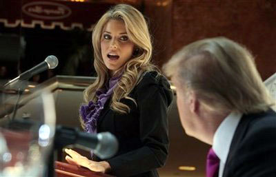 Miss California USA, Carrie Prejean, thanks Donald Trump for his support, during a news conference in New York, Tuesday, May 12, 2009. Trump, who owns the Miss USA pageant, says Prejean can retain her Miss California USA crown after she caused a stir expressing opposition to gay marriage and posing in risque photographs. <br/>(Photo: AP / Bebeto Matthews)