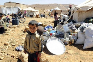 Syrian refugees at Lebanese border town of Arsal, in eastern Bekaa Valley. March 2014 <br/>Reuters