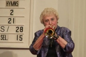ORTV founder Doris Brougham gave a trumpet performance. <br/>Gospel Herald/George Wen