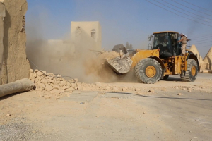Image released late Thursday by an Islamic State militant-affiliated website shows a bulldozer of Islamic State militants destroying the St. Elian Monastery near the town of Qaryatain in Homs province, Syria. <br/>Reuters