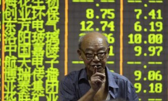 China's stocks fell for the second straight day Tuesday as U.S. futures rise. <br/>AP