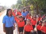 Students and teachers from Mercy Christian School go for a walk