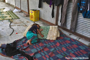 A Syrian refugee child is forced to sleep on a street in Turkey.  <br/>Christian Aid Mission