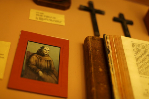 A holy card with the image of Friar Junipero Serra is shown at Mission San Diego de Alcala in San Diego, California, September 14, 2015. REUTERS/Mike Blake <br/>