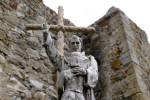 A statue of Friar Junipero Serra is seen at Mission San Juan Capistrano in San Juan Capistrano, California, September 15, 2015. REUTERS/Mike Blake <br/>
