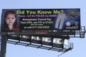 A billboard on Route 95 shows the image of the toddler found on Deer Island, whom police are trying to identify in Canton, Massachusetts, July 20, 2015. REUTERS/MassDOT <br/>