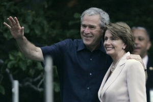 President Bush poses for a photo with House Speaker Nancy Pelosi during the Congressional Picnic, Tuesday, June 19, 2007, on the South Lawn of the White House Washington. <br/>