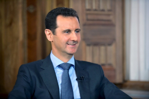 Syria's President Bashar al-Assad answers questions during an interview with al-Manar's journalist Amro Nassef, in Damascus, Syria, in this handout photograph released by Syria's national news agency SANA on August 25, 2015. REUTERS/SANA/Handout via Reuters <br/>
