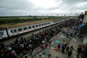 Migrants wait to board a train at the station in Tovarnik, Croatia, September 20, 2015. REUTERS/Antonio Bronic <br/>