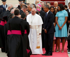 U.S. President Barack Obama (R) welcomes Pope Francis to the United States as the Pontiff shakes hands with dignitaries upon his arrival at Joint Base Andrews outside Washington September 22, 2015. REUTERS/Kevin Lamarque <br/>