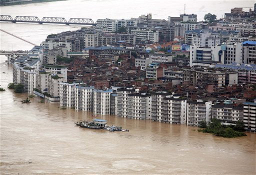 Flood waters are seen in the city of Liuzhou in south China's Guangxi Zhuang Autonomous Region Saturday July 4, 2009. Hundreds of thousands of people have been evacuated from homes in southern and central China after heavy rains toppled houses, flooded roads and damaged a dam. <br/>STR /AP Photo
